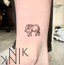 Amazing, detailed, tiny elephant tattoo. Small fine line elephant tatoo with lots of detail. Foxy Ink Tattoo Studio Bristol.