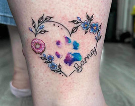 memorial fine line tattoo with watercolour paw print and amazing small details. forget me nots and name tattoo. Micro tattoo artist. Tiny donut tattoo. Foxy Ink Tattoo Studio Bristol.
