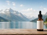 CBD online kaufen Schweiz – neutrale Glasflasche vor Schweizer Alpenlandschaft
