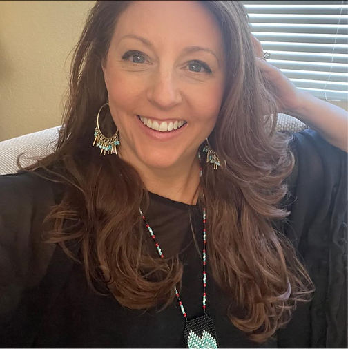 angela headshot blkack.jpeg