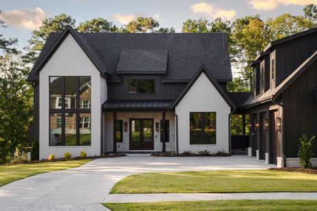 Luxury custom home during golden hour on Lake Murray in Chapin, South Carolina.