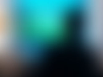 A man sitting and watching a golf swing tutorial.