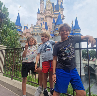 Kids with the Disney castle behind them