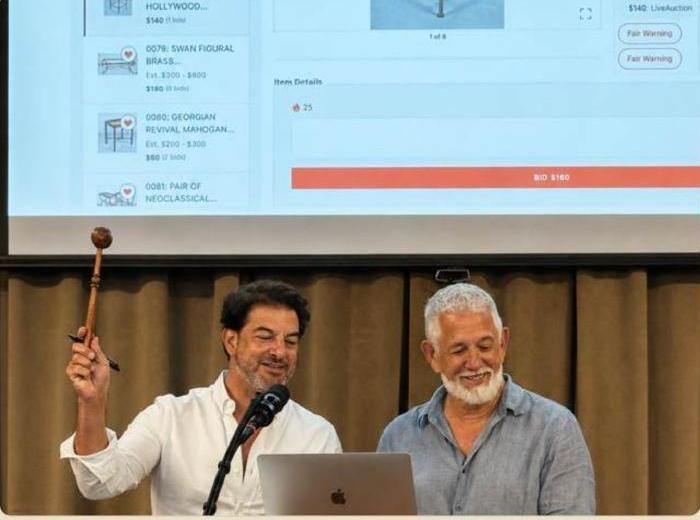 Roy and Carlo at the auction