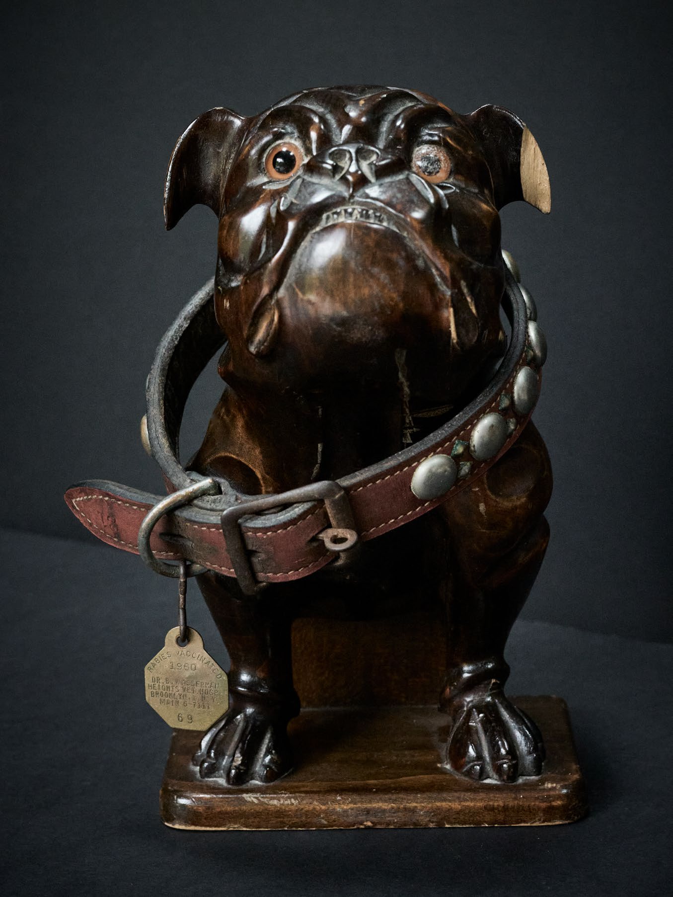 Lot 7 — ANTIQUE BLACK FOREST STYLE CARVED BULLDOG WALL POCKET