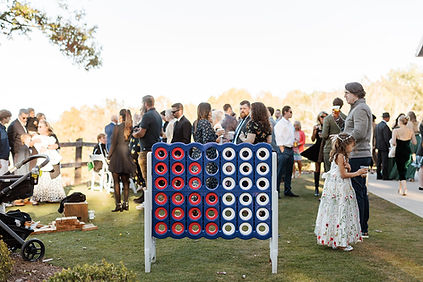 guests enjoying play lawn games during a fun wedding cocktail hour
