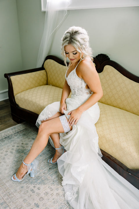 bride getting ready for the wedding in the bridal cottage