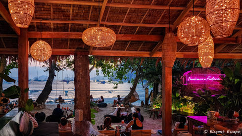Bar on the beach with neon lights in El Nido. El Nido or Coron Philippines travel blog suggestion. Best travel Blog. Luxury Travel. Travel Reviews. Best Blog.