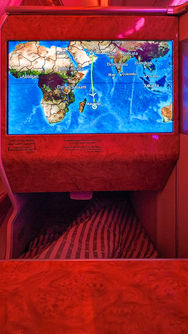 Large ICE IFE in flight entertainment screen on Emirates A380 in Business Class. Flight review. Luxury travel. First Class. Best travel blog.