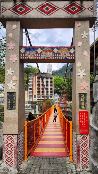 Pedestrian suspension bridge in town during the walk from Hoshinoya Guguan luxury hotel in Taiwan, best hotel in the world, best travel blog, luxury travel blog, five star hotel.