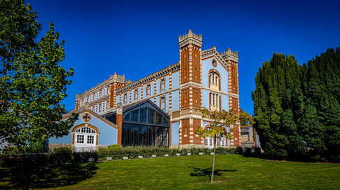 Main building for the tour at Champagne Pommery in Reims Champagne France. Luxury Wine Travel Blog.