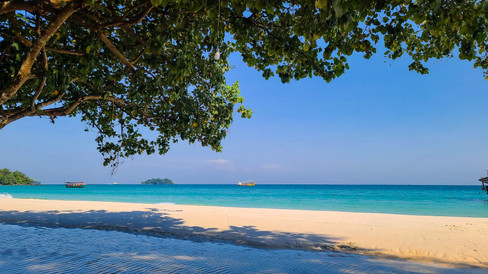 Beautiful Koh touch beach in Koh Rong Island, Cambodia on Elegant Escape the best luxury Travel Blog.