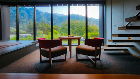 Sitting area in the suite of the Hoshinoya Guguan luxury hotel in Taiwan, best hotel in the world, best travel blog, luxury travel blog, five star hotel.