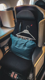 Business class seat Air France A350 with full recline lay flat seat and extra legroom. Luxury flight. Luxury Travel Blog.