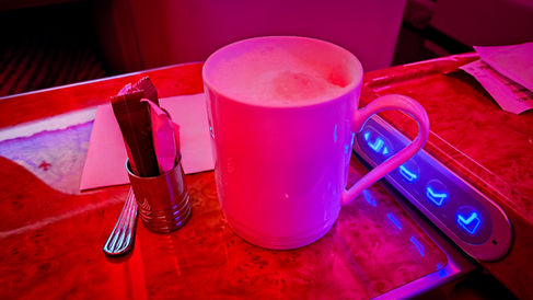 Breakfast latte on Emirates A380 in Business Class. Flight review. Luxury travel. First Class. Best travel blog.