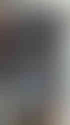 An open empty small travel packing closet from the side