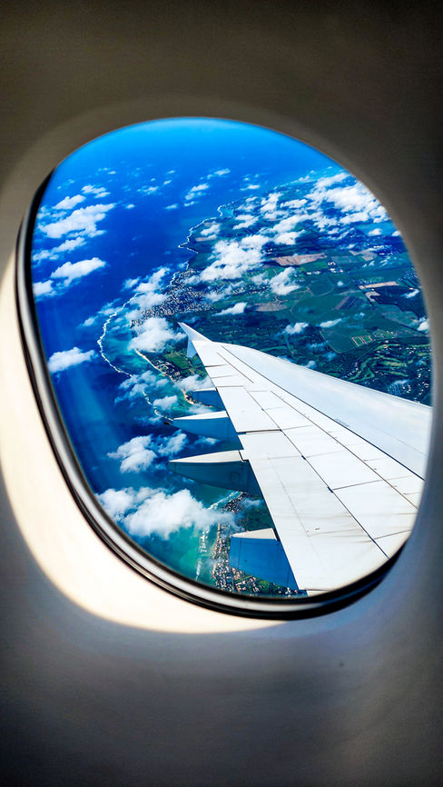 Wing view from the top half of Emirates A380 in Business Class. Flight review. Luxury travel. First Class. Best travel blog.