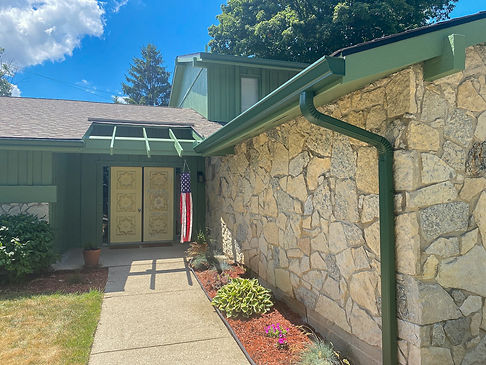 Custom Green Gutter Installation on Stone Siding Home in Middletown Ohio | Miami Valley Roofing & Restoration LLC
