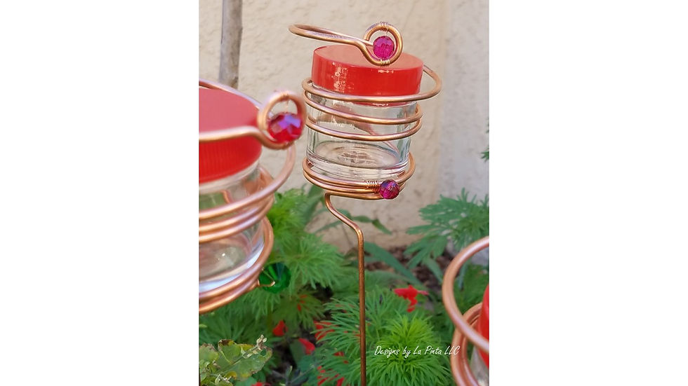 Our Copper Wire Stake Hummingbird Feeders are embellished with Crystals to attract more Hummingbirds.
