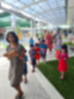 Blockhouse Bay teachers and students parading around the school