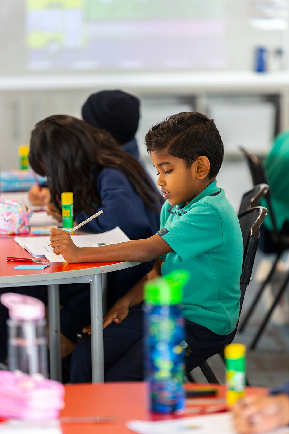 Halsey Drive School student working at desk
