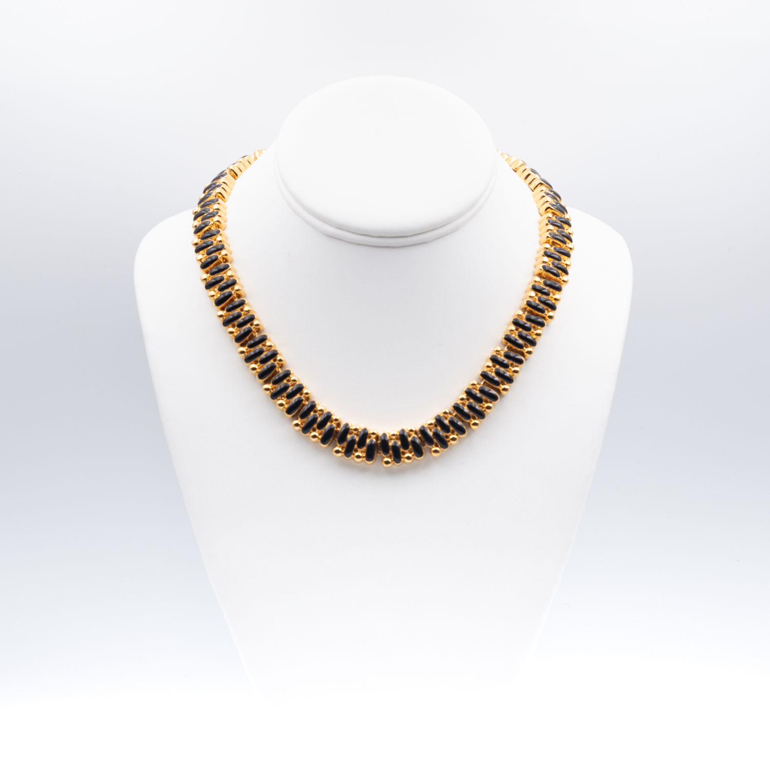 Vintage necklace with black enamel