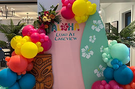 Vibrant Feature backdrop with surfboard for photobooth