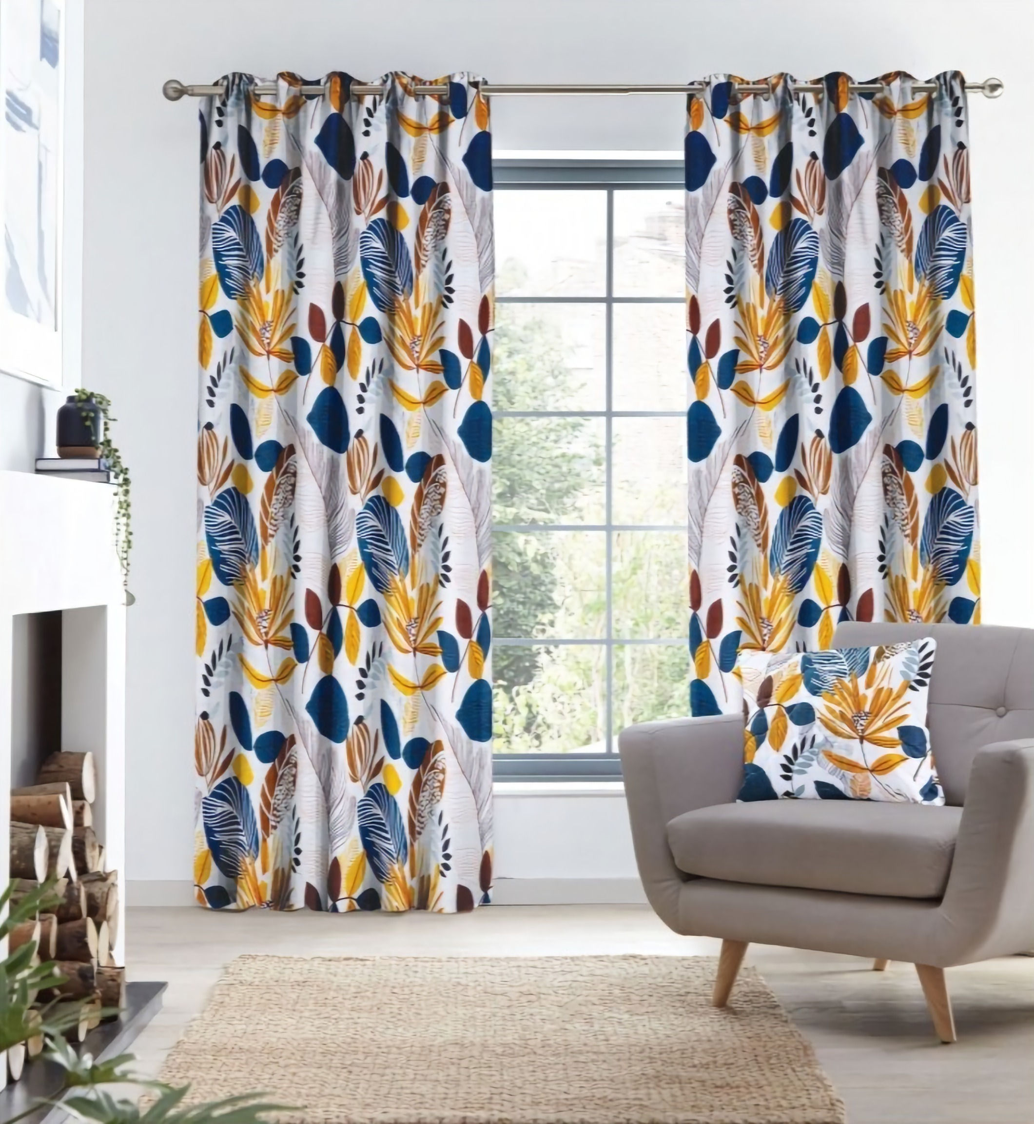 Blue and Mustard "leaves" design curtains hanging in front of window