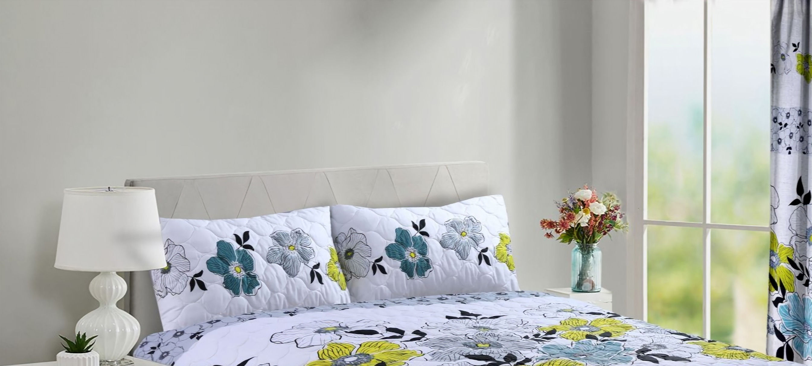 Grey "Manna" Pillowsham on bed