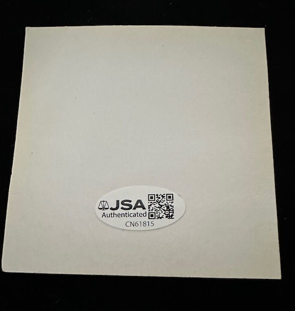 Thumbnail: JSA sticker on back of item