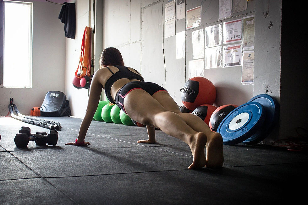 a woman keeping fit in her home gym during a Coronavirus lockdown