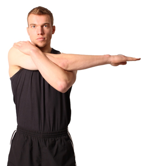 A man performing shoulder stretches.