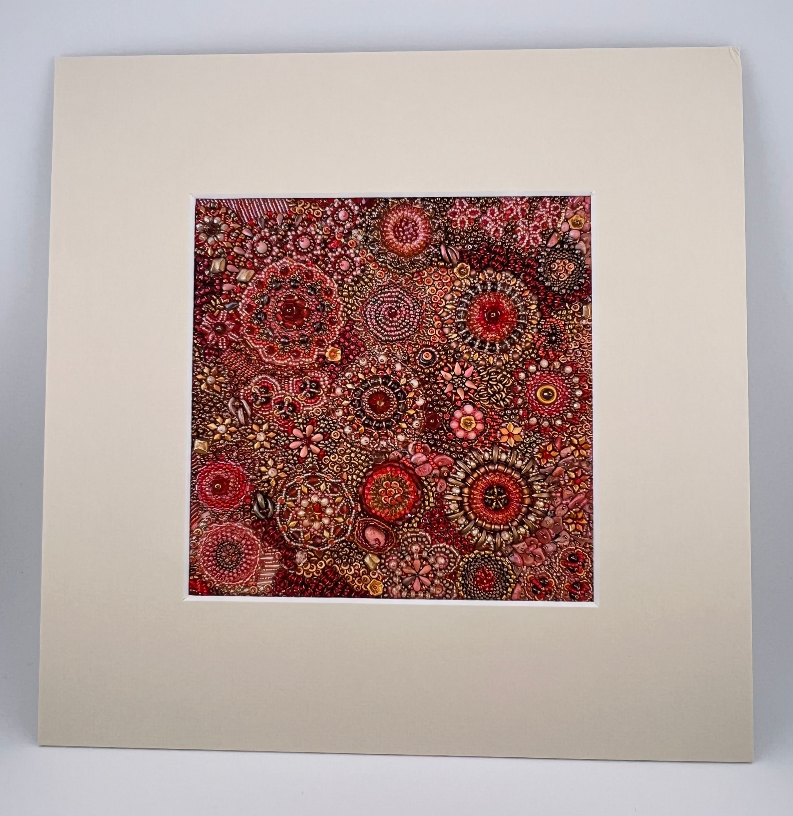 Print of Red and Pink Bead Embroidery