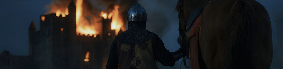 Chevalier et son cheval devant un château en feu