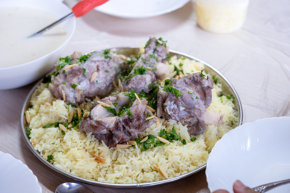 Jordanian mansaf on family table for dinner ready to be eaten looks hot and fresh with mea