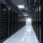A modern data center corridor with high-tech server racks, essential for cloud computing and data management.