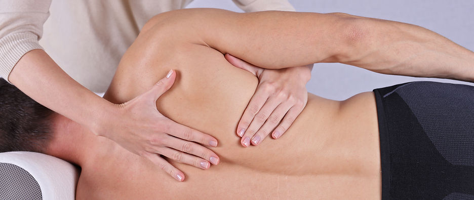 Osteopath treatement to patient's upper back