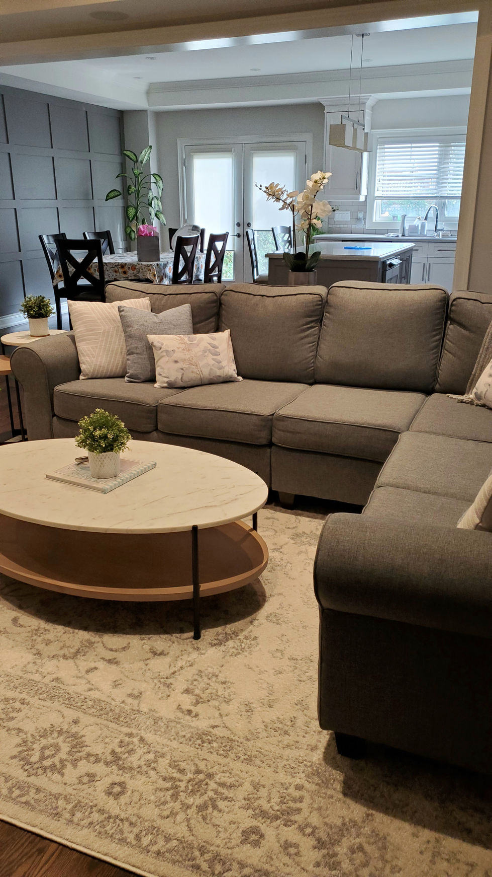 Marble and wood oval coffee table