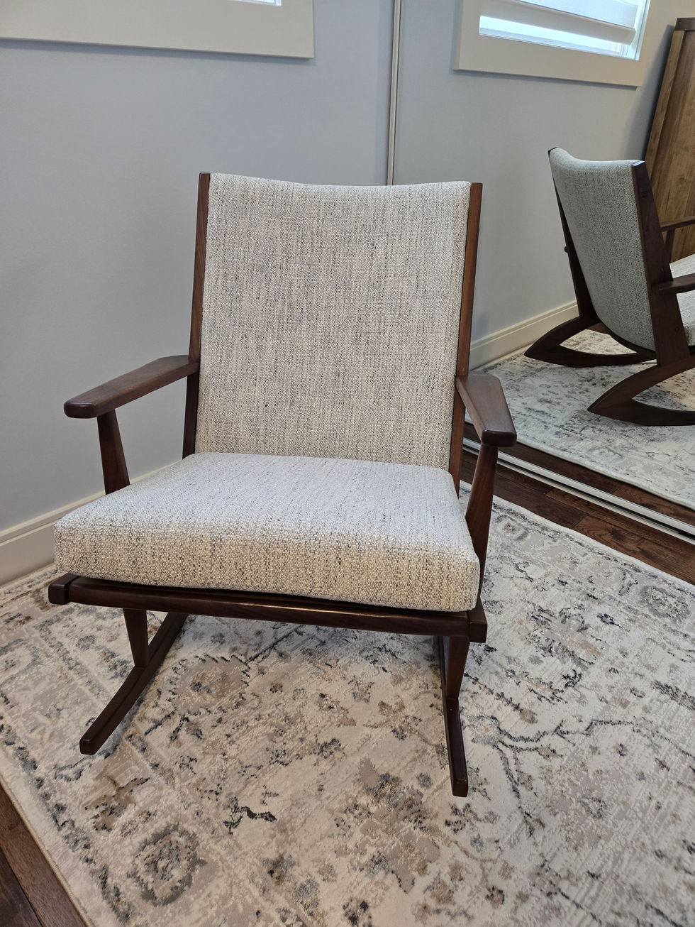 reupholstery of teak rocking chair, new area rug