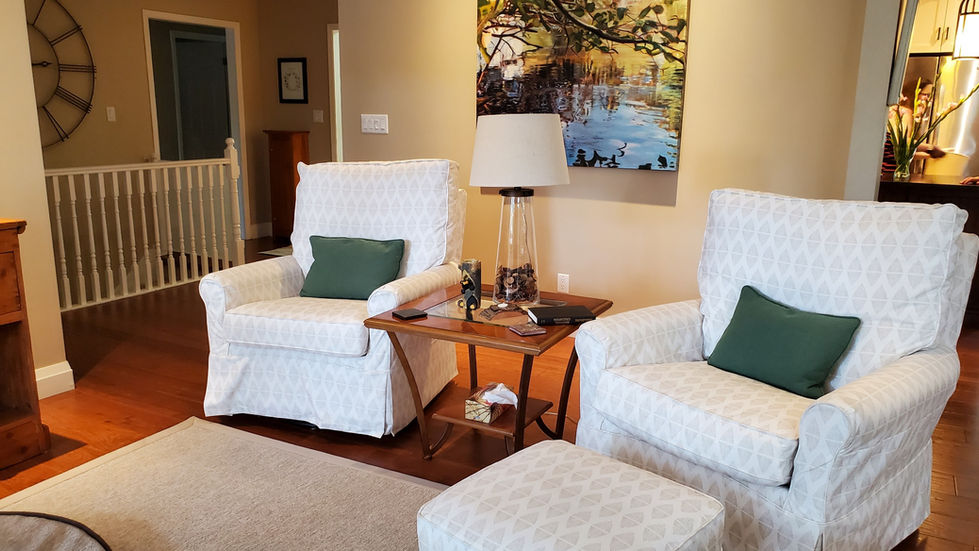 Slipcovered chairs in Cottage living room refresh