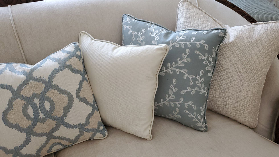 Reupholstery of antique sofa with custom toss pillows