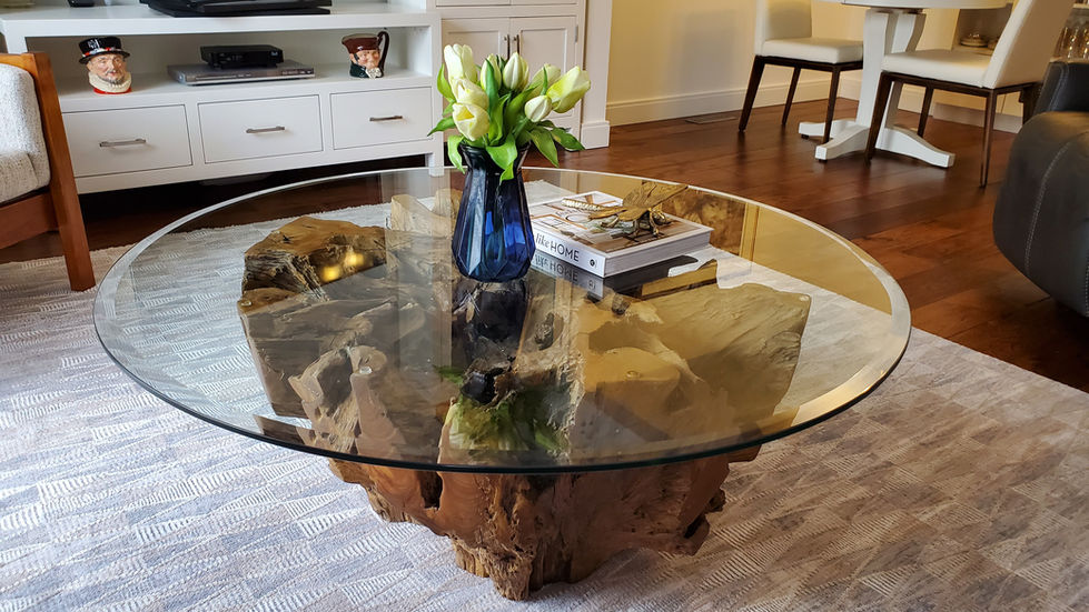 Living Room refresh with Mid-century modern teak furniture, custom toss pillows, wood root coffee table, new area rug, custom cabinets and new Canadian-made wood dining table and chairs