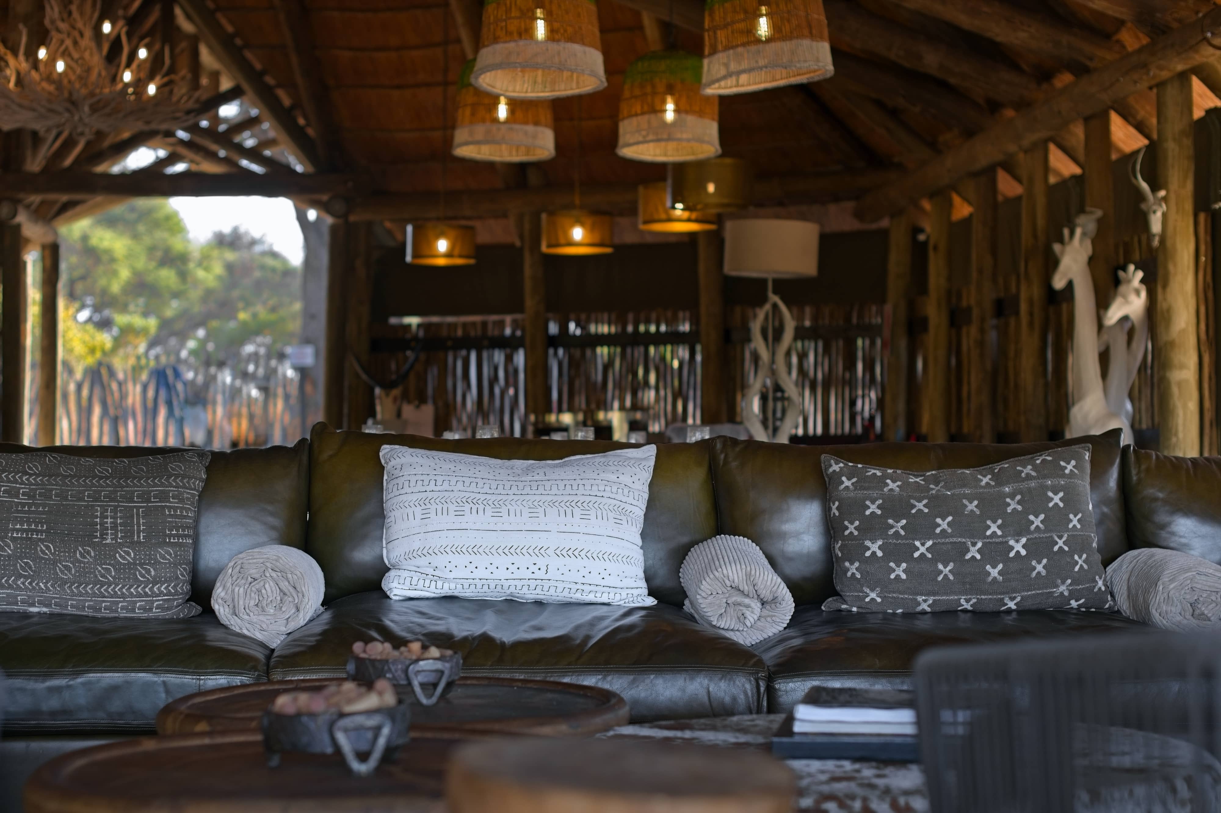Mogotlho Safari Lodge couch with african fabric cushions