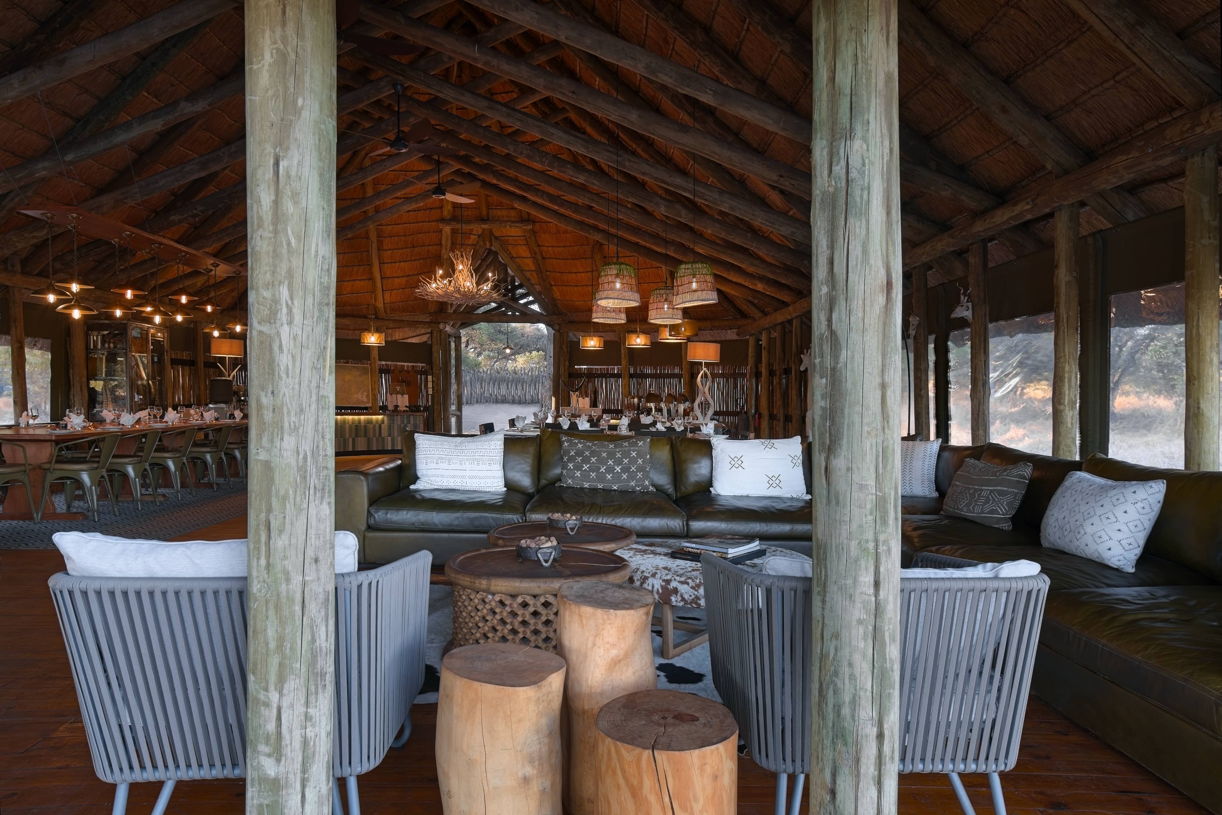 Mogotlho Safari Lodge lounge area with african reed ceiling shown