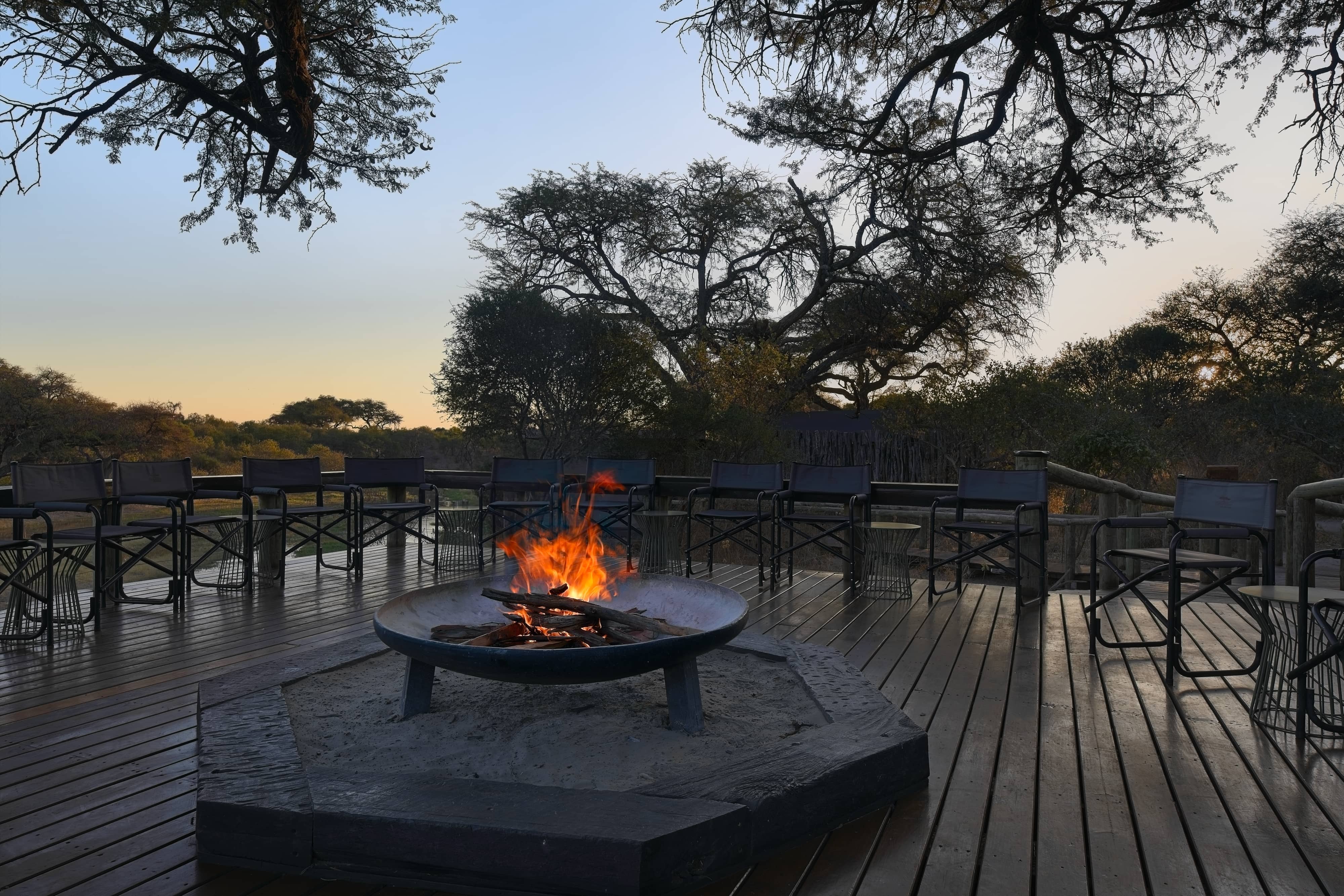 Lifestyle photo of a camp fire in the evening