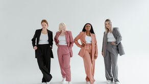 Female entrepreneurs preparing for ReInvestWealth event