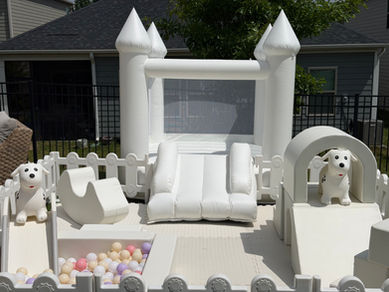 All white soft play rental with an all white castle top bounce house.