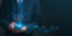 Businessman with a digital shield and lock icon, cybersecurity, and data protection.Privac
