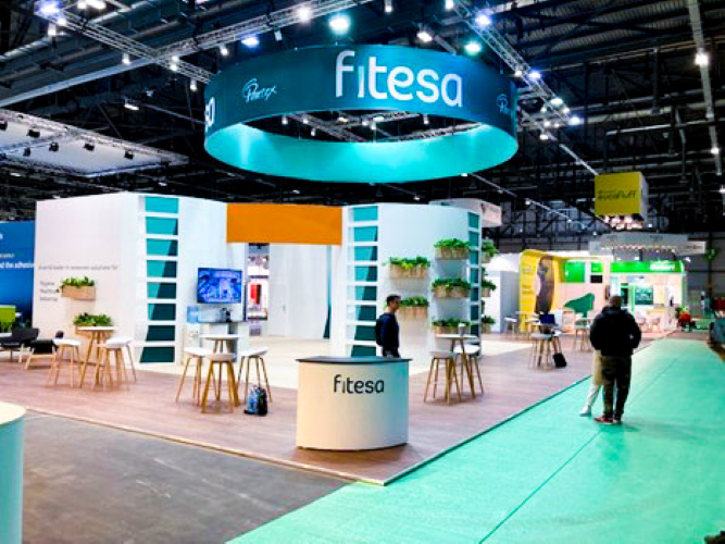 Fitesa trade show exhibit featuring modern design and open collaboration spaces.