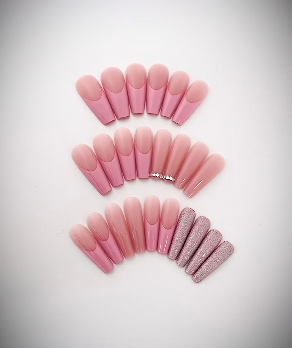 Arielle features soft pink nude nails with delicate blush pink french tips with solid pink nude accent nails with rhinestones
